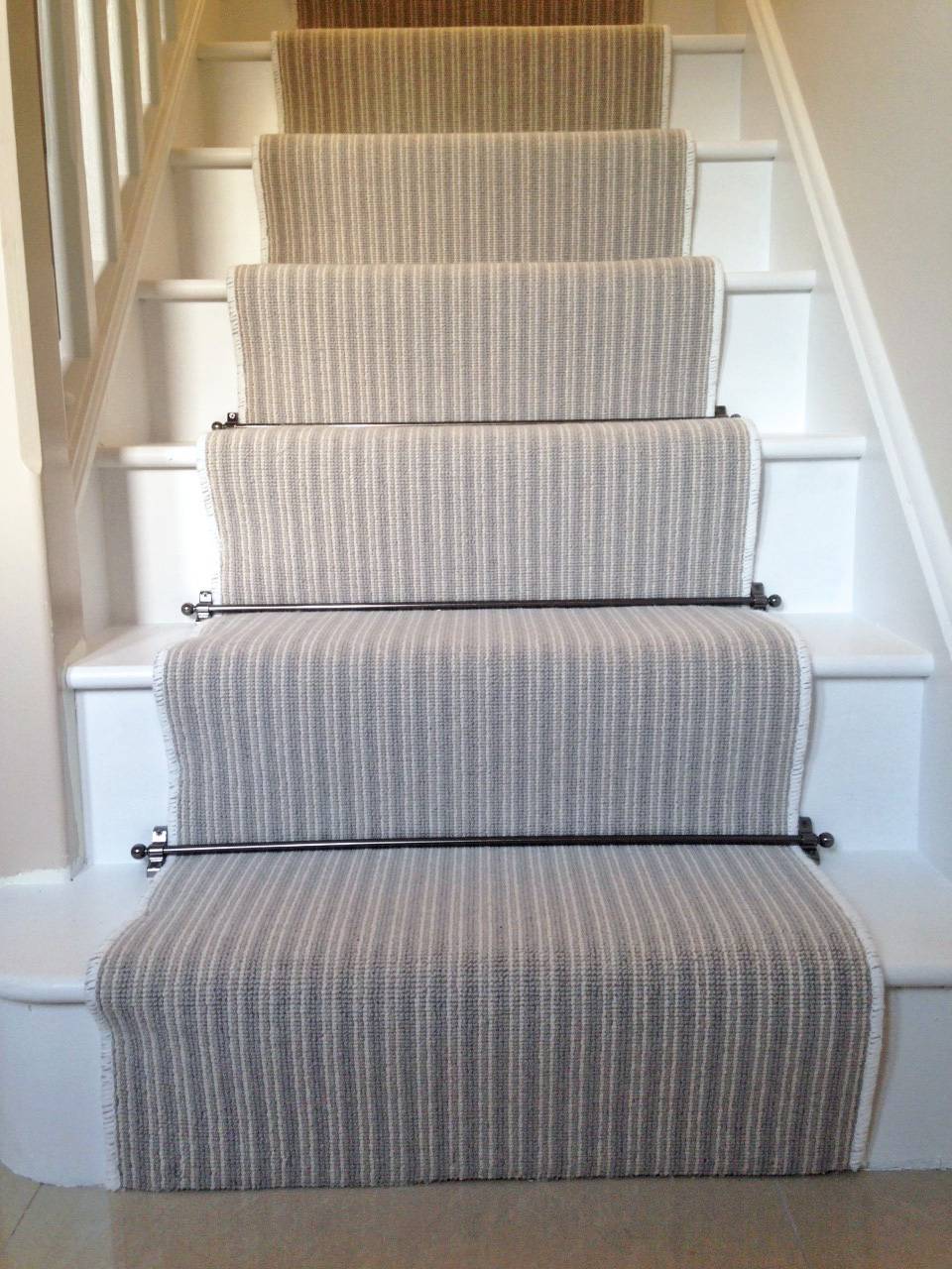 fitting job with stair runner and rods