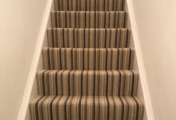 striped carpet on someone's stairs