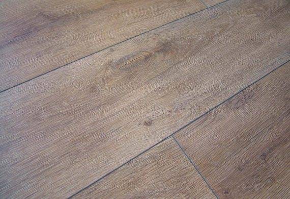 Kronotex 12mm laminate flooring in Premium Oak colour