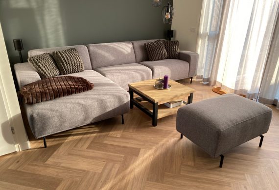 Herringbone Flooring with a greyish sofa