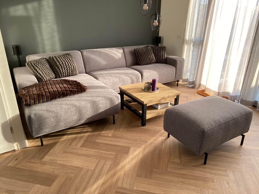 Herringbone Flooring with a greyish sofa