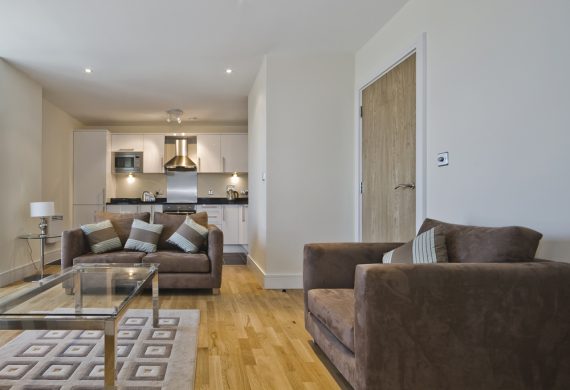 A sleek laminate flooring in a living room