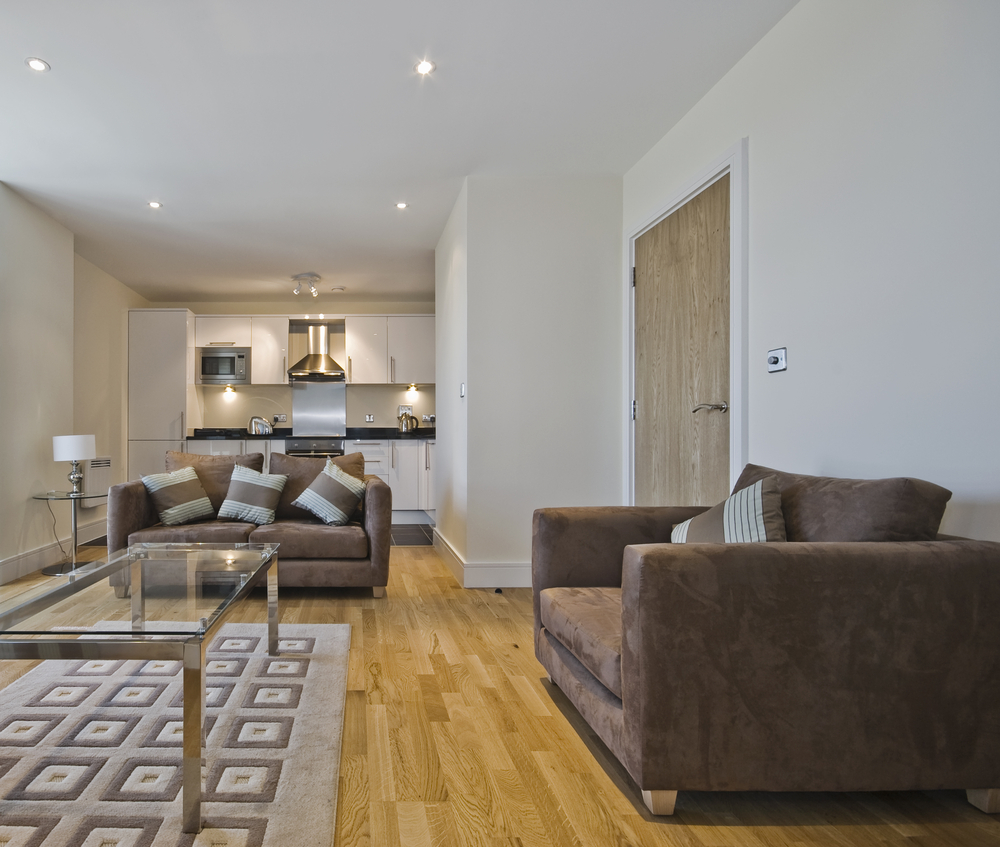 A sleek laminate flooring in a living room